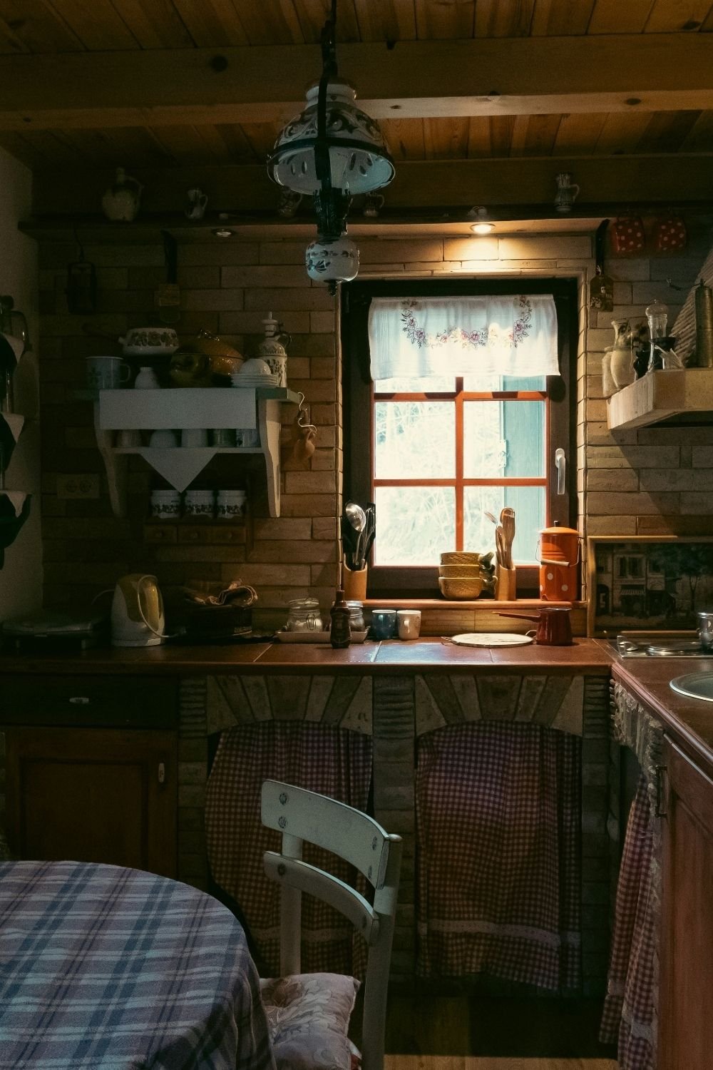 Love Grandma-Core but Want Something Darker? Try This Cozy Kitchen Aesthetic